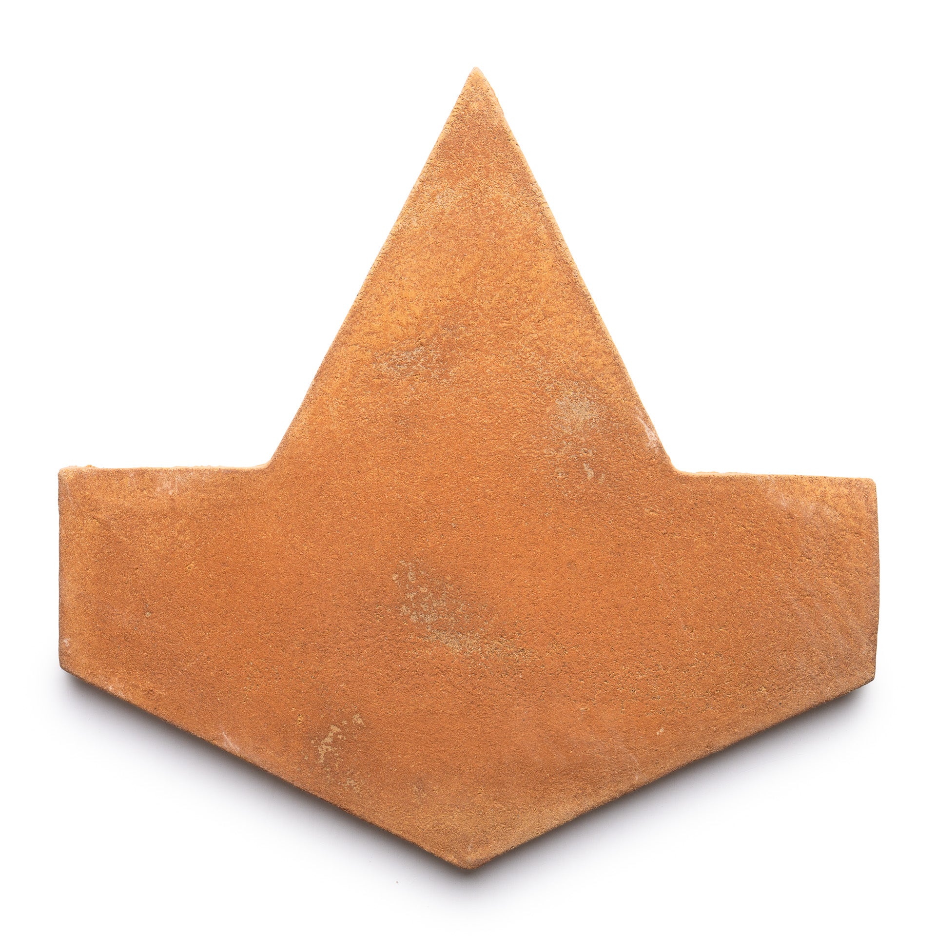 A single Big Alcazar + Fired Earth tile by Zia Tile, featuring a chevron shape with a pointed top and two slanted sides, displayed on a white background.