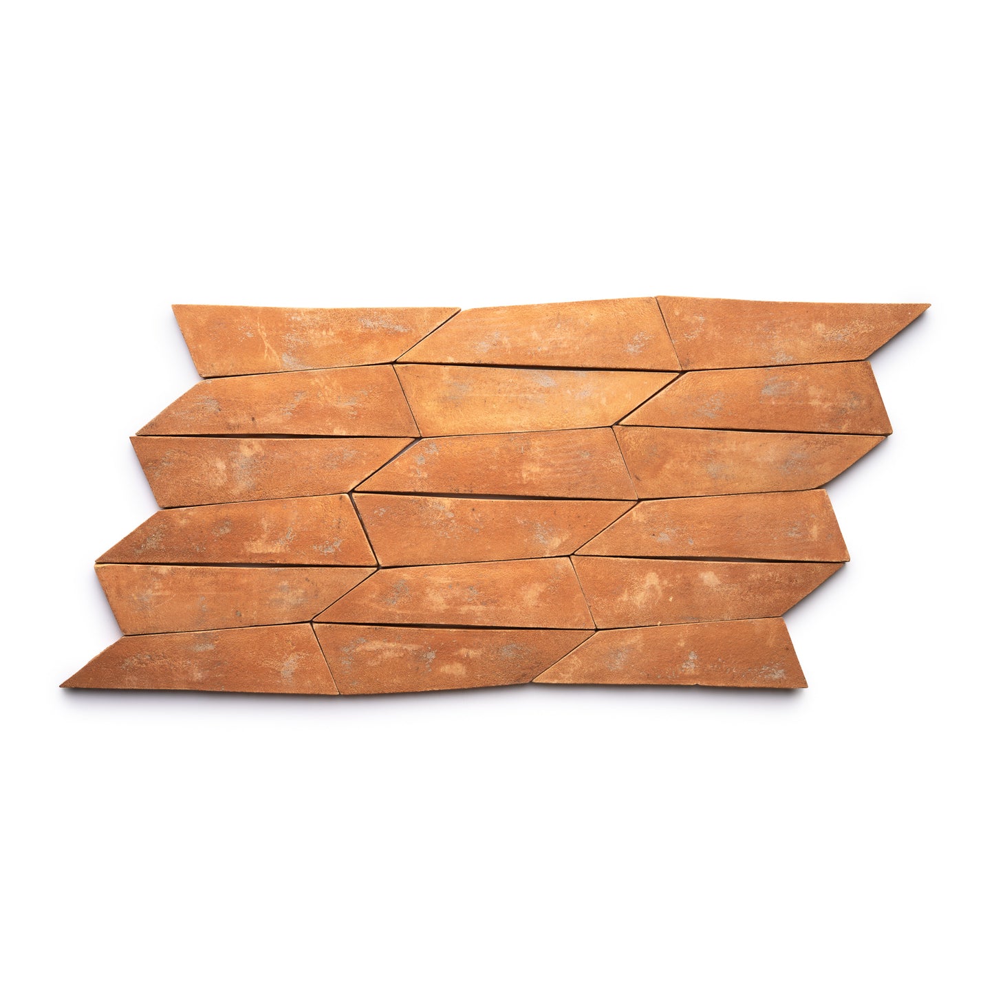 Ten orange-brown Tornillo + Fired Earth tiles by Zia Tile are arranged in three staggered rows, creating a geometric, arrow-like pattern against a white background.