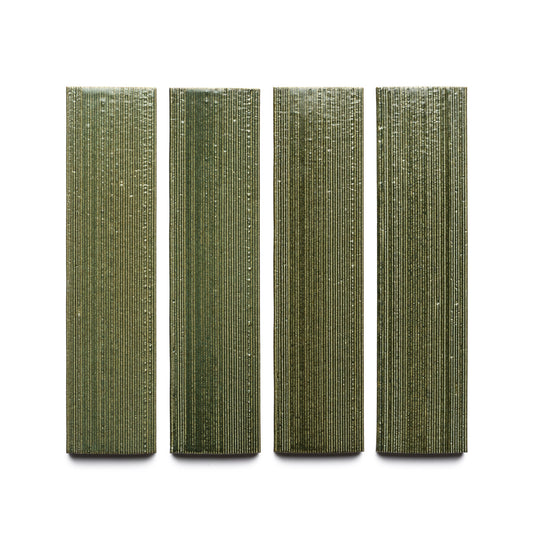 Four Frogtown + Etched rectangular green textured tiles by Zia Tile are arranged vertically in a row on a white background.