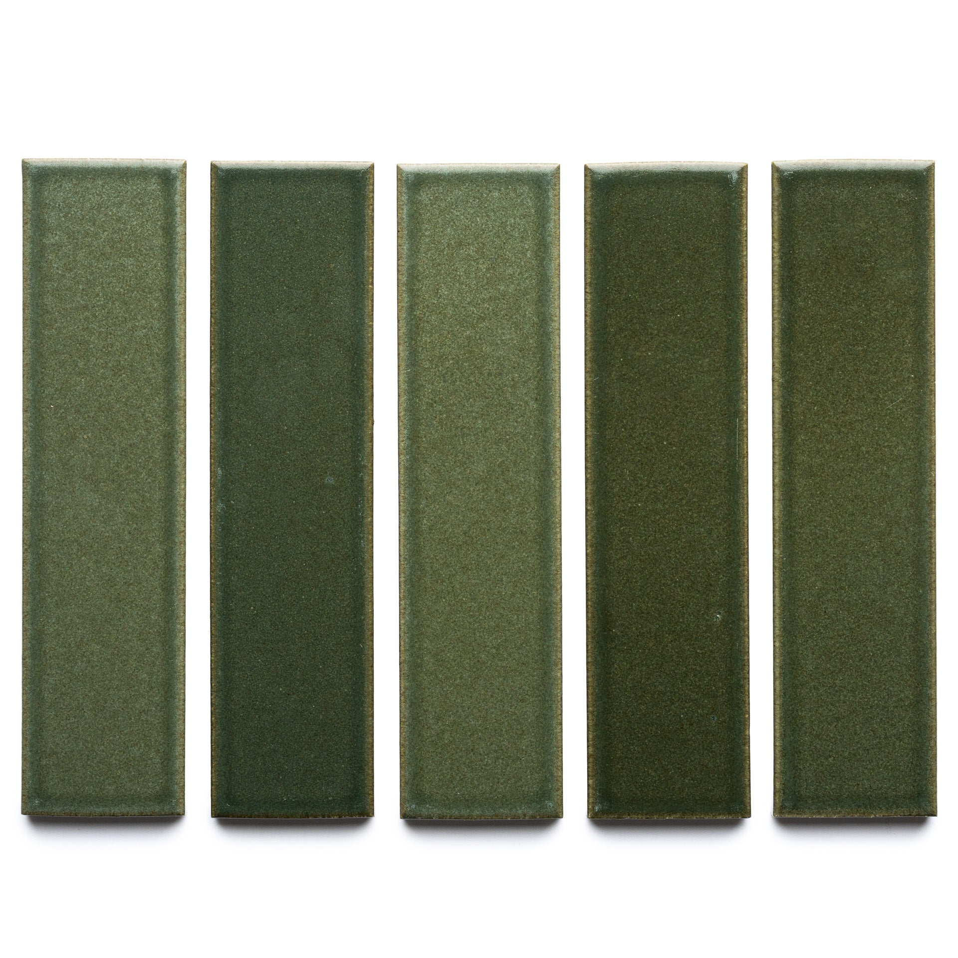 Five Frogtown + Flat ceramic tiles by Zia Tile, in varying green shades, are arranged vertically in a row against a white background.