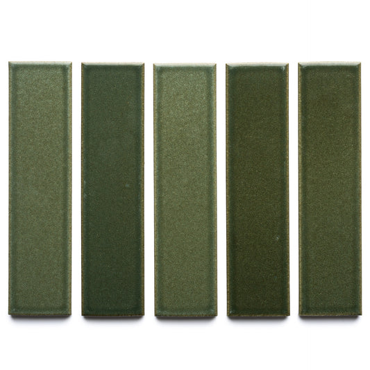 Five Frogtown + Flat ceramic tiles by Zia Tile, in varying green shades, are arranged vertically in a row against a white background.