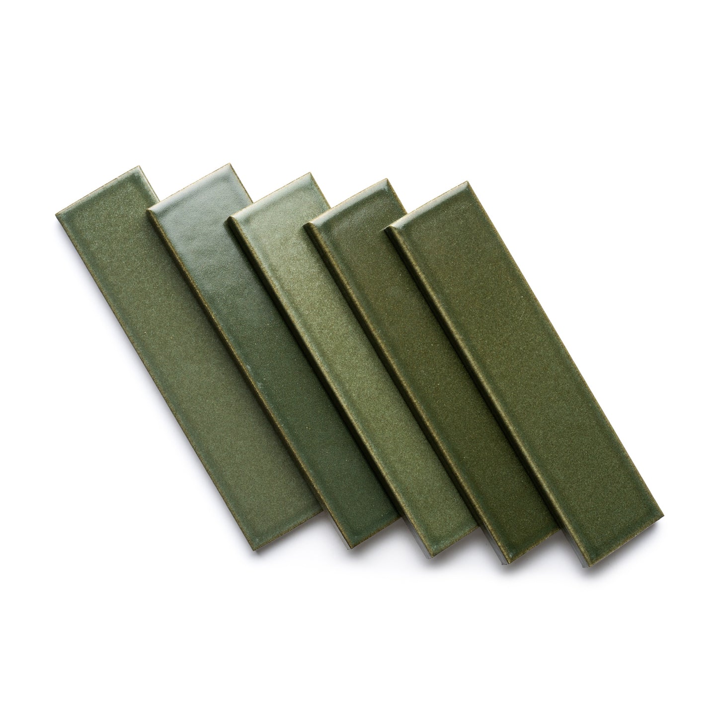 Five Frogtown + Flat rectangular green ceramic tiles by Zia Tile are arranged in a slightly fanned, overlapping pattern on a white background.