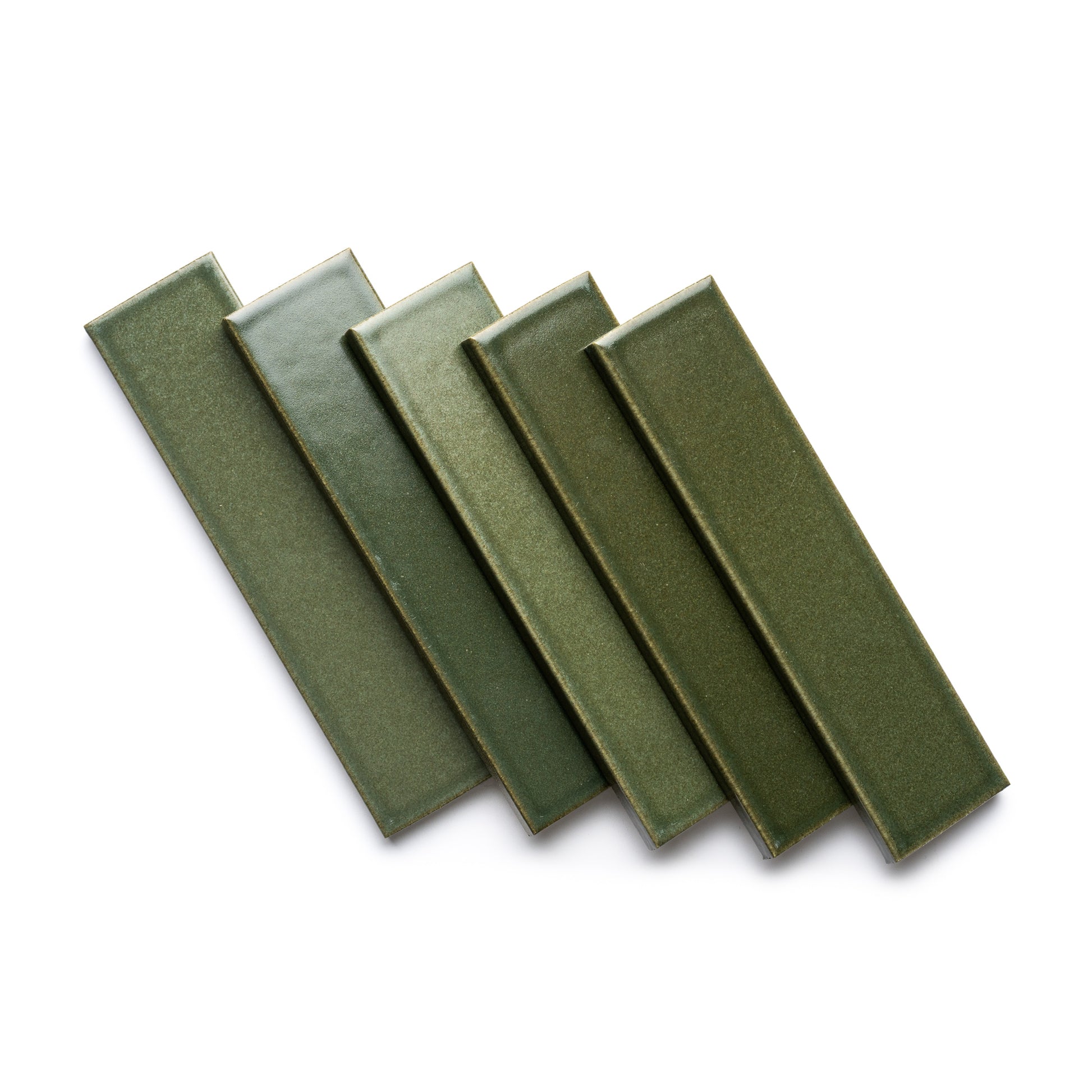 Five Frogtown + Flat rectangular green ceramic tiles by Zia Tile are arranged in a slightly fanned, overlapping pattern on a white background.