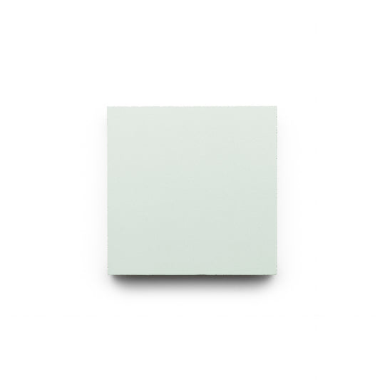 The Julep 4x4 tile by Zia Tile, a plain light gray handmade square, is centered on a white background.