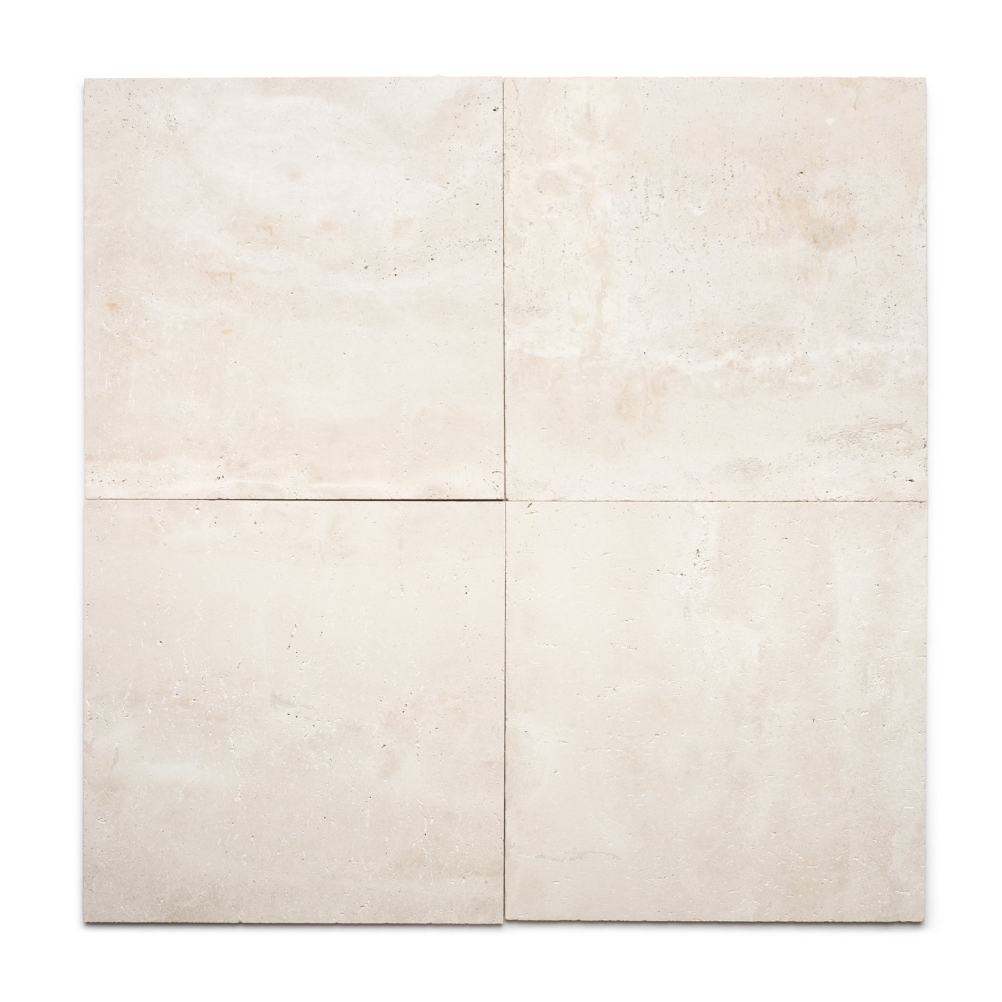 Four Mesa 24x24 tiles by Zia Tile are arranged in a 2x2 grid on a white background, displaying subtle texture and color variations typical of authentic Cantera volcanic stone.