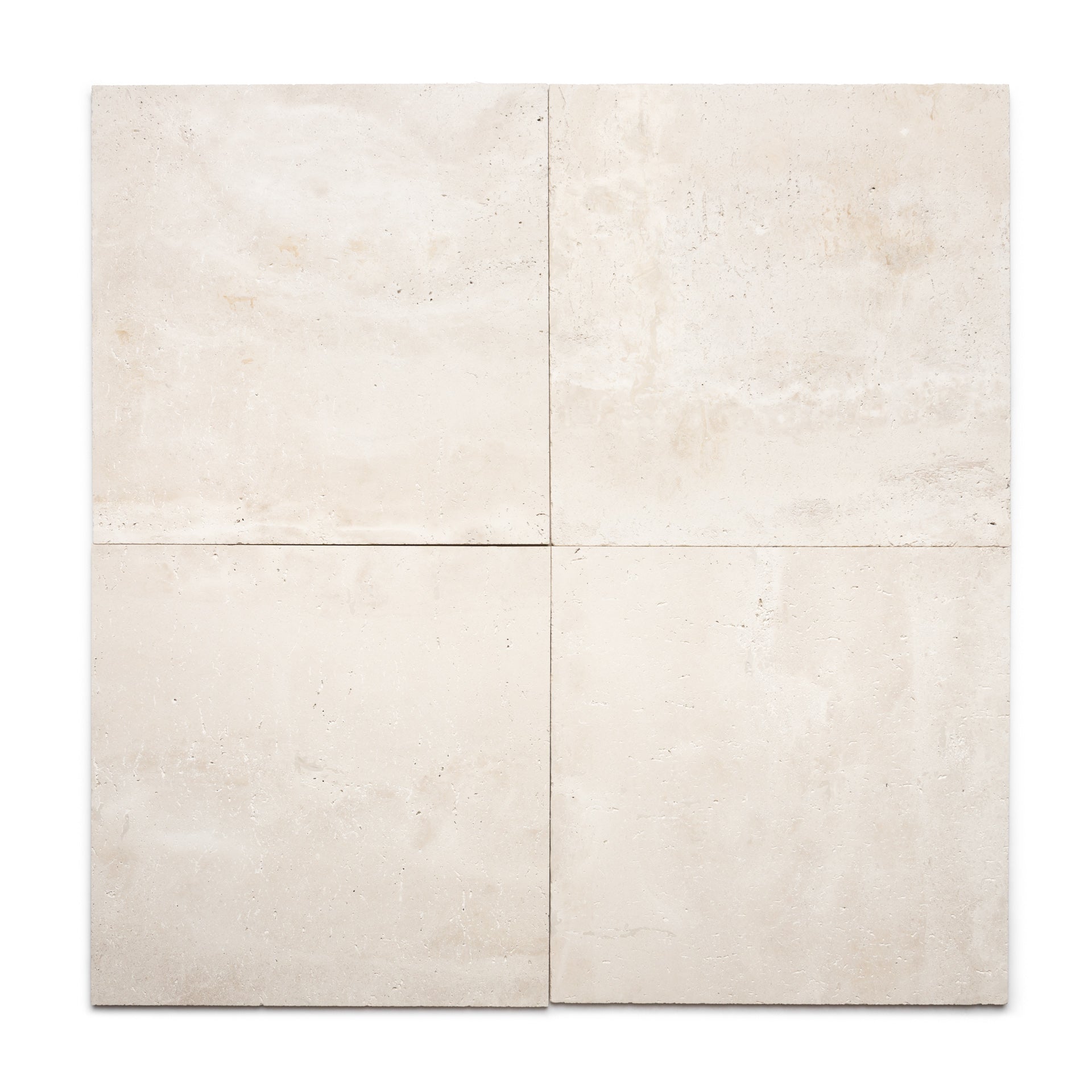 Four Mesa 24x24 tiles by Zia Tile are arranged in a 2x2 grid on a white background, displaying subtle texture and color variations typical of authentic Cantera volcanic stone.
