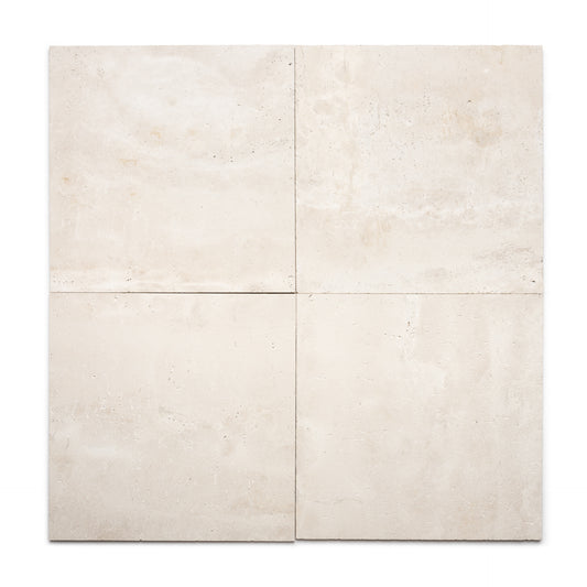 Four Mesa 24x24 tiles by Zia Tile are arranged in a 2x2 grid on a white background, displaying subtle texture and color variations typical of authentic Cantera volcanic stone.