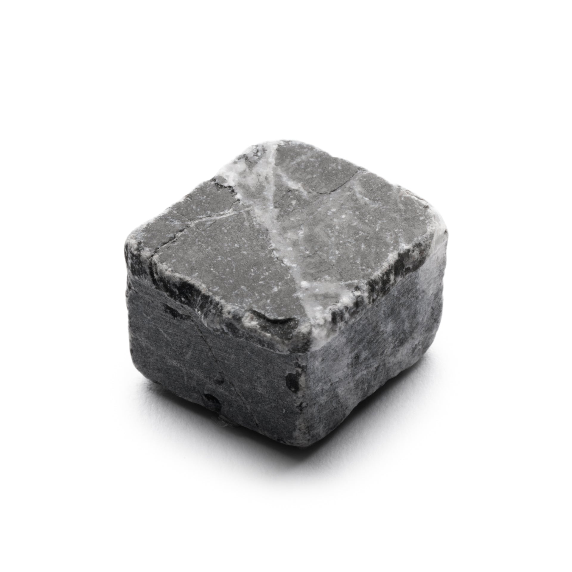 The Mini Check in Carrara + Grigio Carnico by Zia Tile is a single, rough, square gray tile with white streaks displayed on a plain white background.