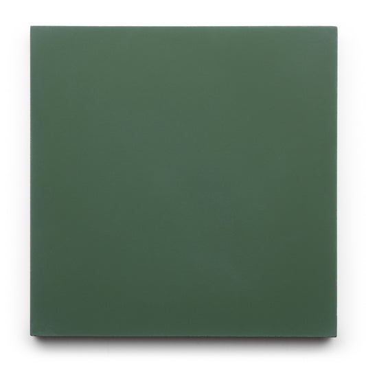 The Noble Green 8x8 by Zia Tile is a square, solid-colored handcrafted tile in a dark green shade, shown on a white background.