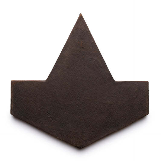 The Big Alcazar + Oscura tile by Zia Tile is a dark, flat, brown tile shaped like an arrowhead with a wide base and pointed top, shown on a white background.
