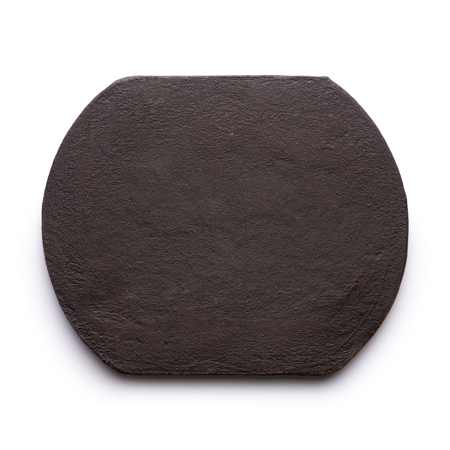 The Oaxaca + Oscura by Zia Tile is a flat, dark brown, roughly octagonal stone slab with a textured surface, shown against a white background.