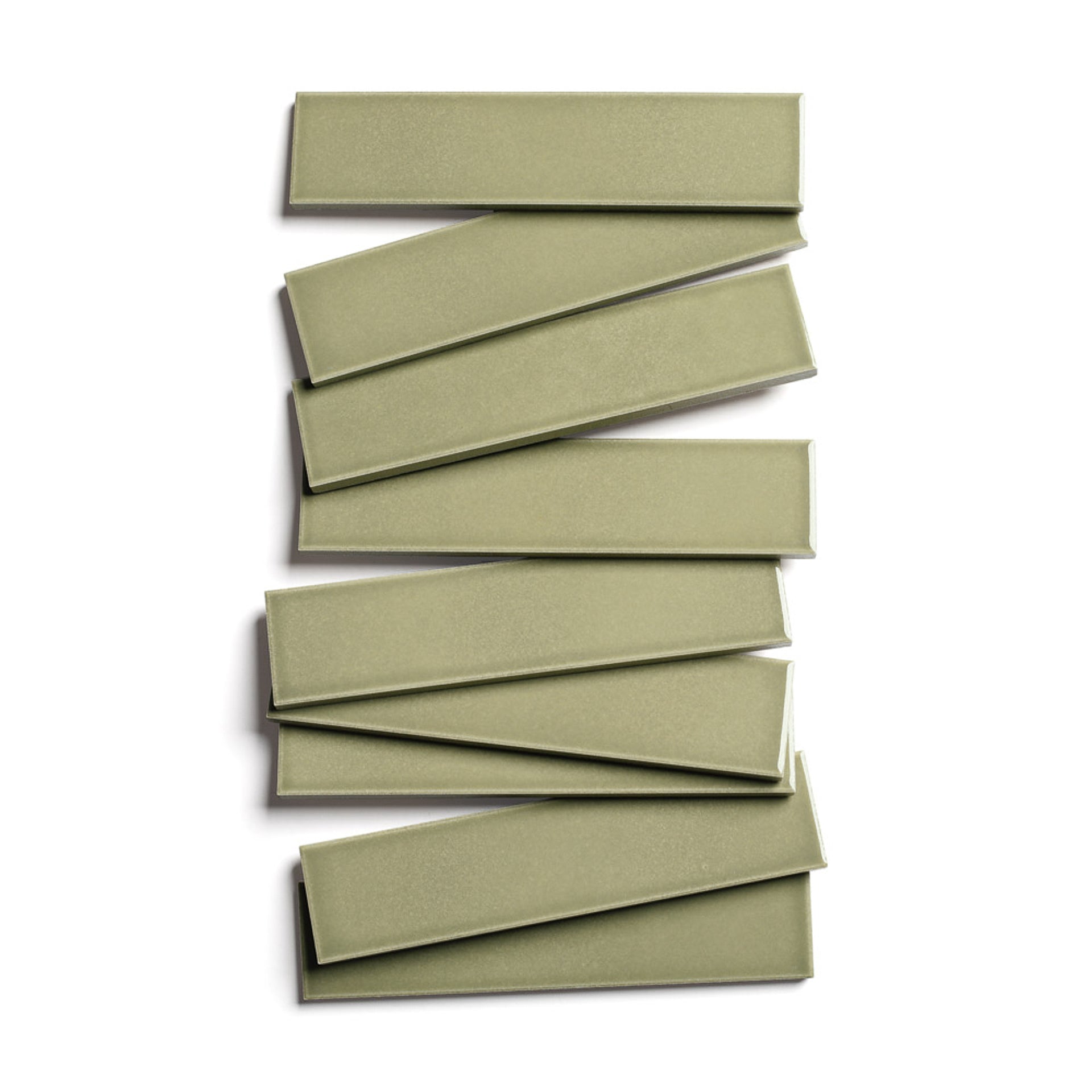 Nine Ponderosa 2x8 olive-green glossy ceramic tiles by Zia Tile are stacked in a staggered zigzag pattern on a white background.