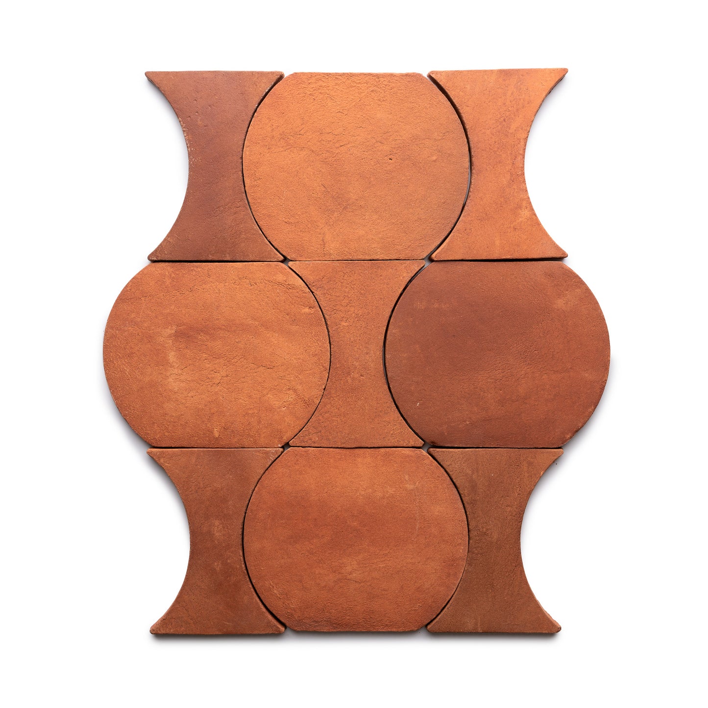 Six Oaxaca + Red Clay tiles by Zia Tile are arranged in a grid. Their curved sides form an interlocking pattern of circular and hourglass shapes on a white background.