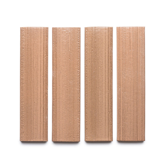 Four rectangular Sakura + Etched brown wafers from Zia Tile are arranged vertically in a row on a white background.