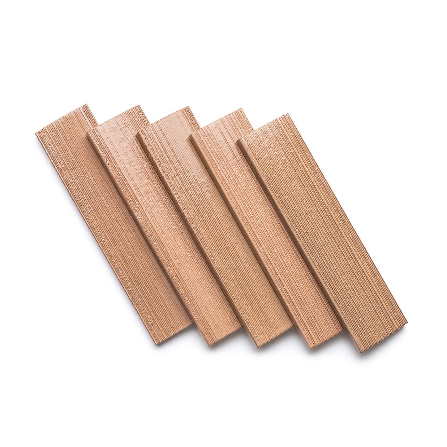 Five Sakura + Etched rectangular wooden blocks by Zia Tile are fanned out on a white background, each displaying the natural wood grain texture.