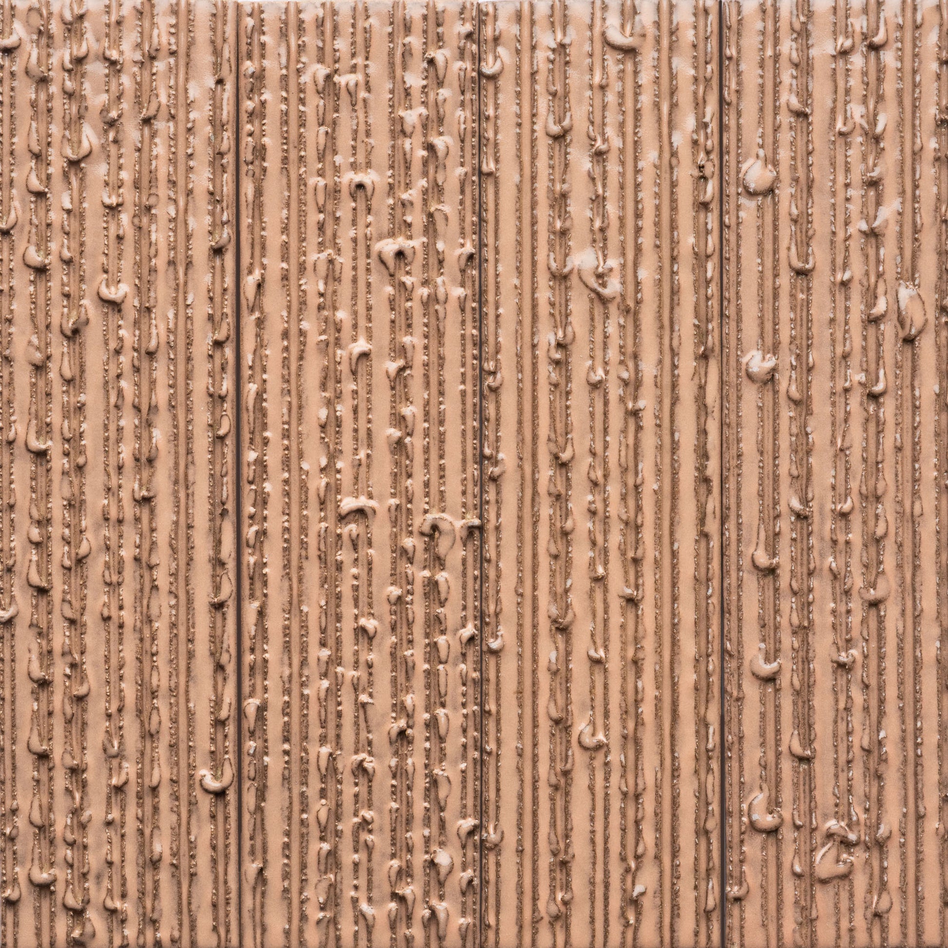 Close-up of the Sakura + Furrowed tile by Zia Tile, showing vertical textured lines with uneven streaks and lumps that create a patterned surface.
