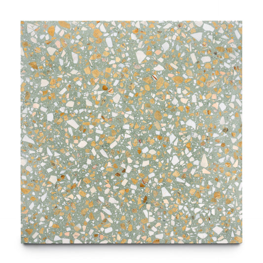 The Salt Bush 24x24 tile by Zia Tile is a square terrazzo tile with a light green base, showcasing white and yellow-orange chips in an irregular, speckled mosaic pattern for a distinctive look.