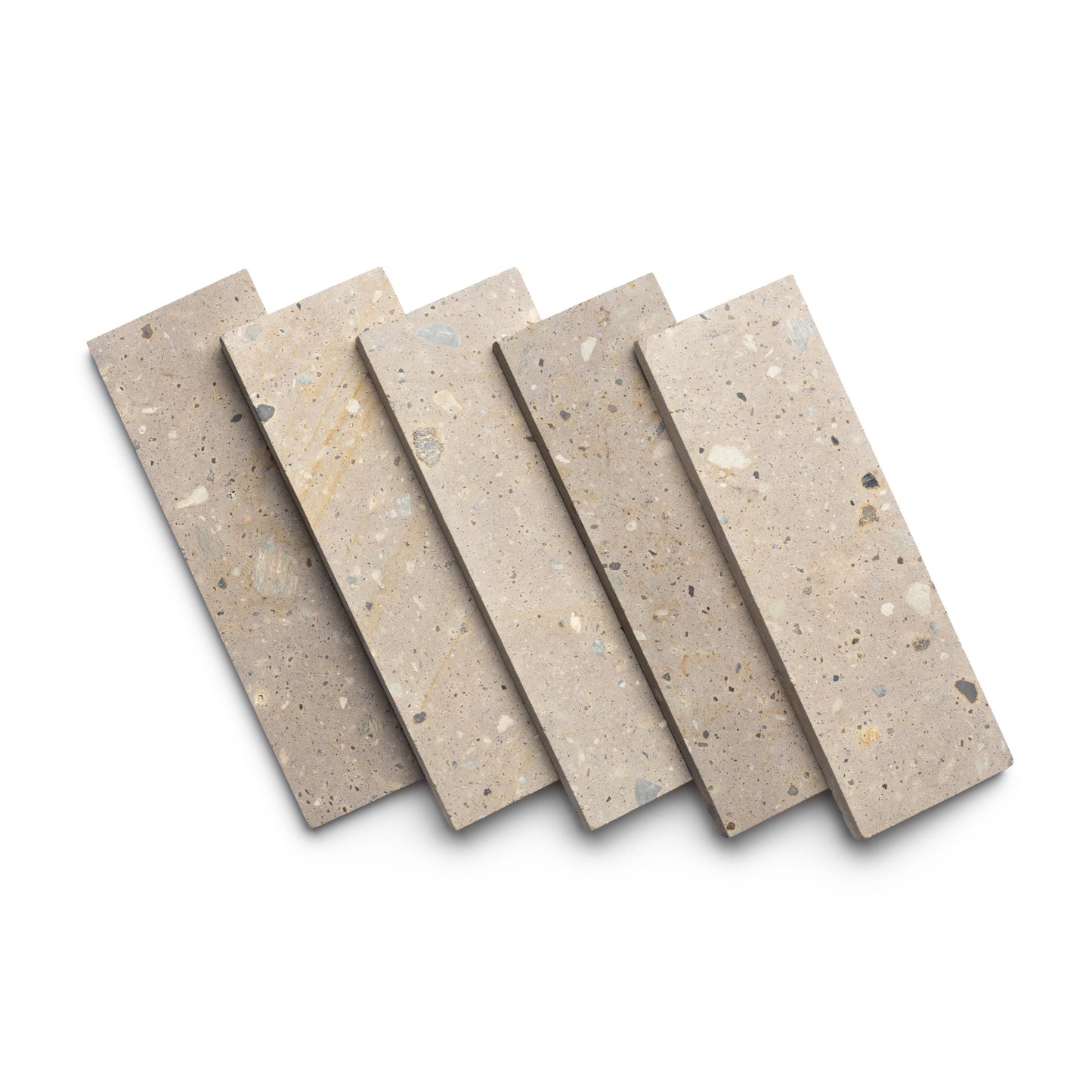 Five Zia Tile Sierra 4x12 rectangular tiles in neutral tones, fanned out on a white background. The tiles have a speckled look with small fragments, highlighting the natural beauty of volcanic stone.