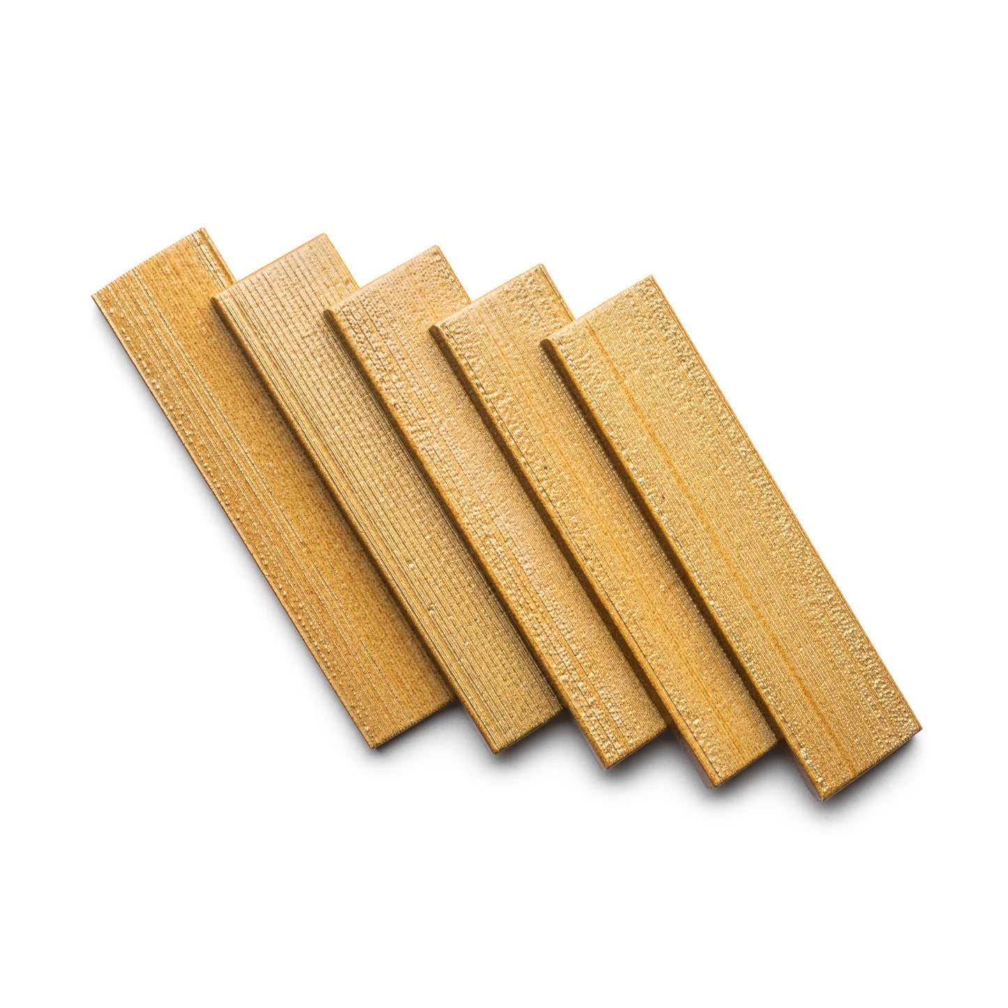 Five Toast + Etched rectangular wooden planks from Zia Tile overlap diagonally on a white background.