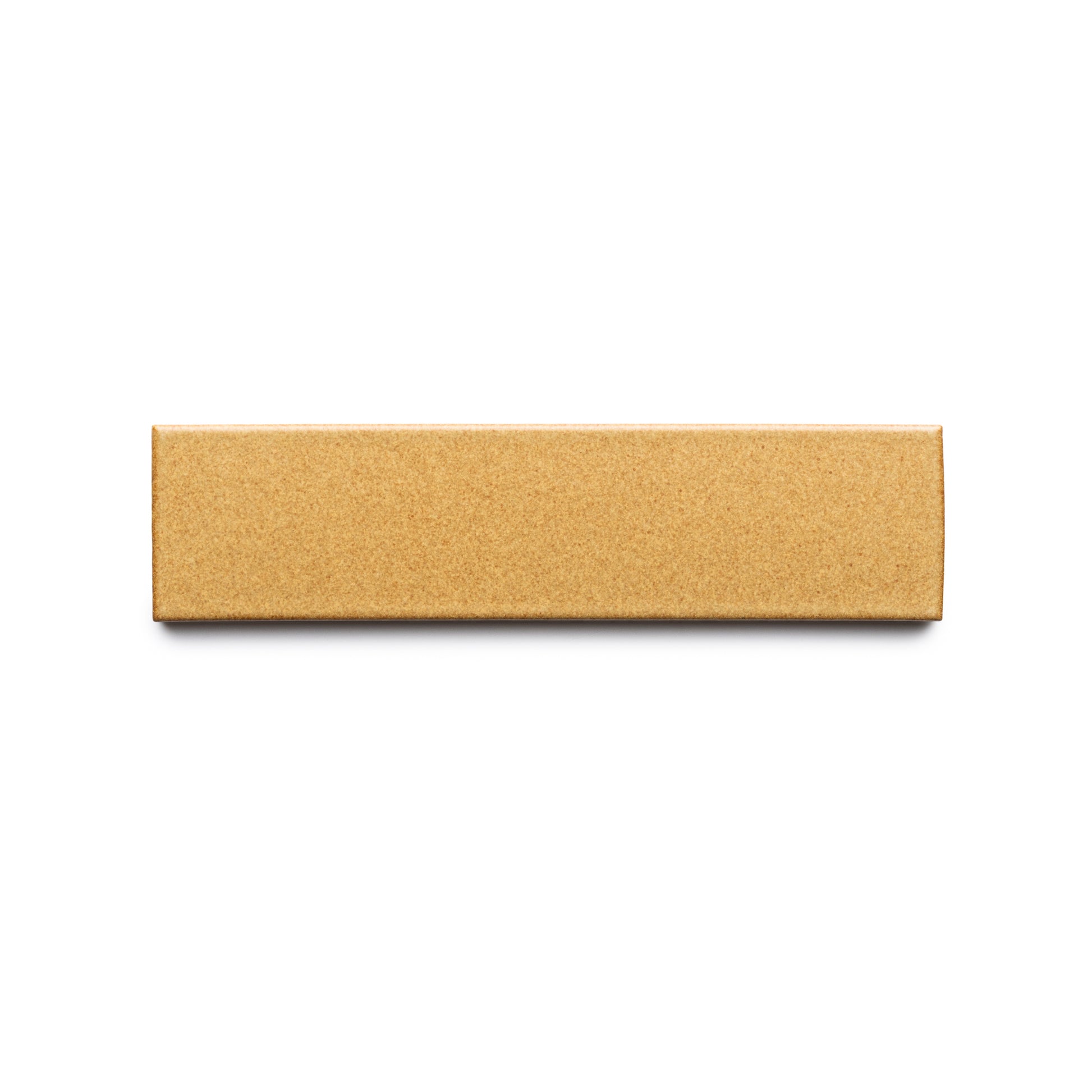 A closed, unmarked Toast + Flat box from Zia Tile is centered on a white background and viewed from above.