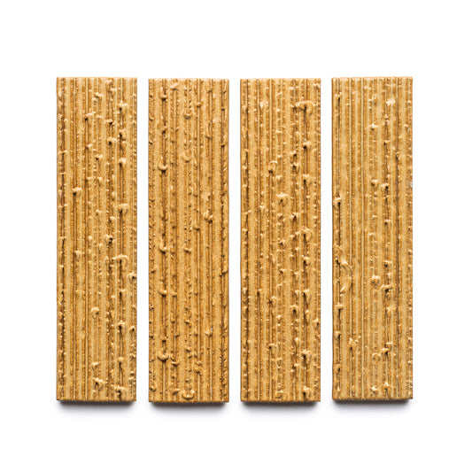 Four rectangular Toast + Furrowed crackers by Zia Tile are arranged vertically on a white background. Each cracker features a ridged surface with visible seeds and grains.