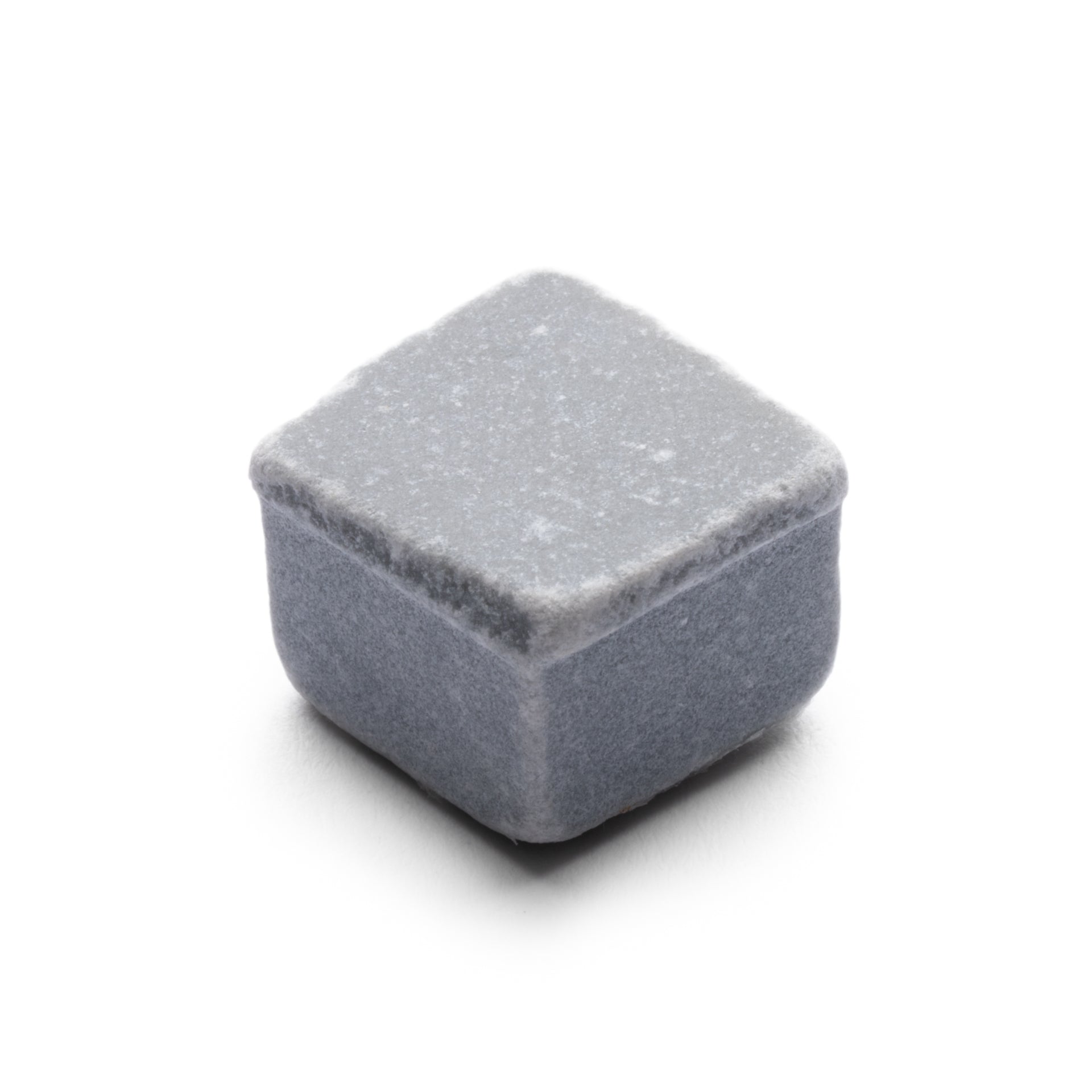 The Ventaglio in Bardiglio Imperiale by Zia Tile is a single gray whiskey stone with a soft, matte texture and rounded edges, shaped like a small cube, shown on a white background.