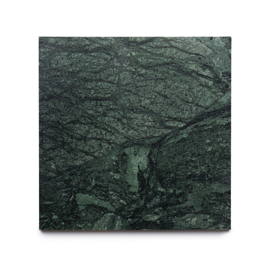 The Verde Alpi 12x12 by Zia Tile is a square dark green marble tile with natural, irregular light and dark veining, reminiscent of luxurious handmade tiles, shown on a white background.