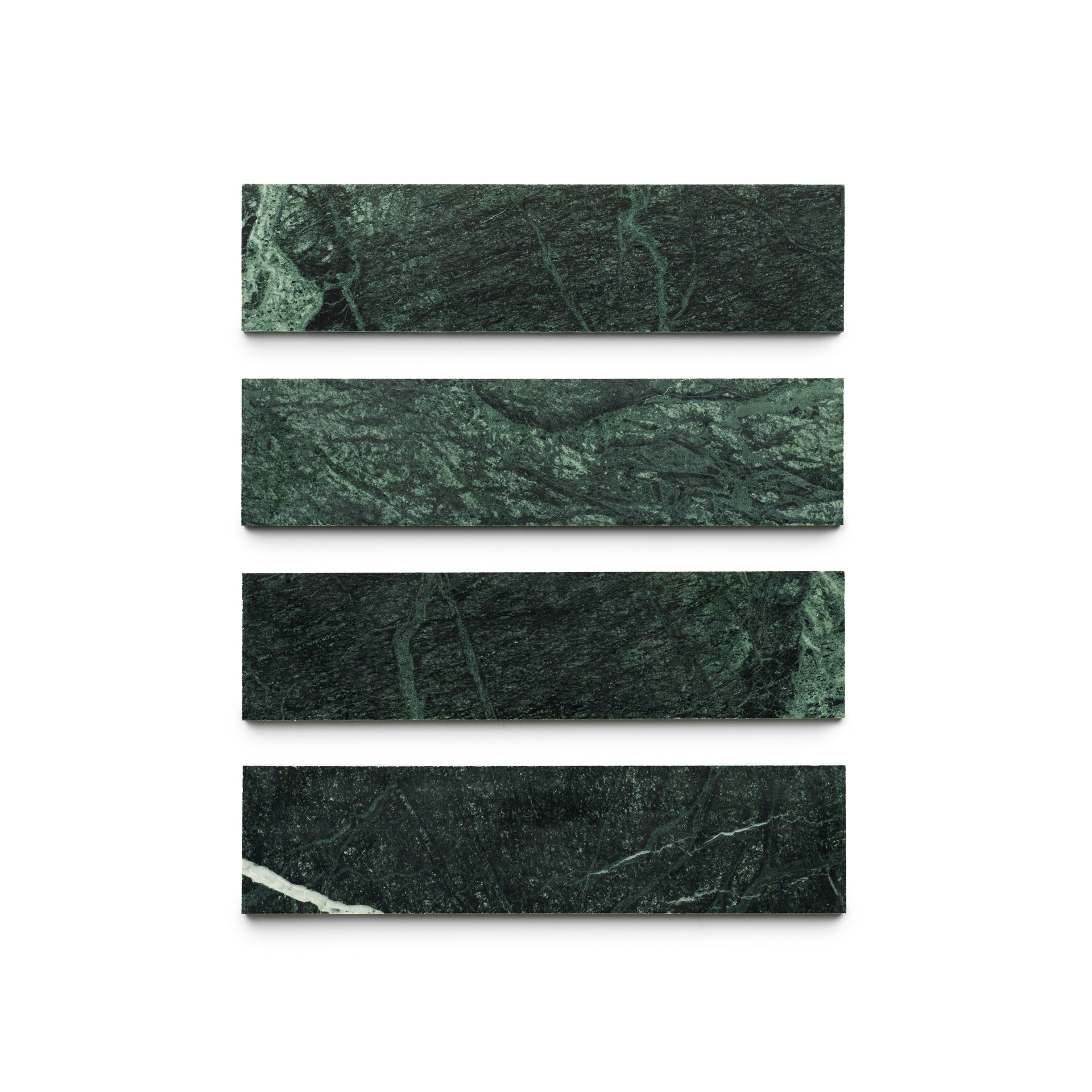 Four rectangular Verde Alpi 3x12 tiles by Zia Tile, in dark green marble with natural veining, are vertically stacked with even spacing on a white background, highlighting Zia Tile’s signature handmade craftsmanship.