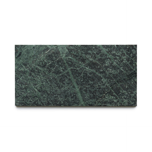 The Verde Alpi 6x12 by Zia Tile features a rectangular dark green marble slab with light green and white veining, creating a natural, textured look similar to handmade tile.