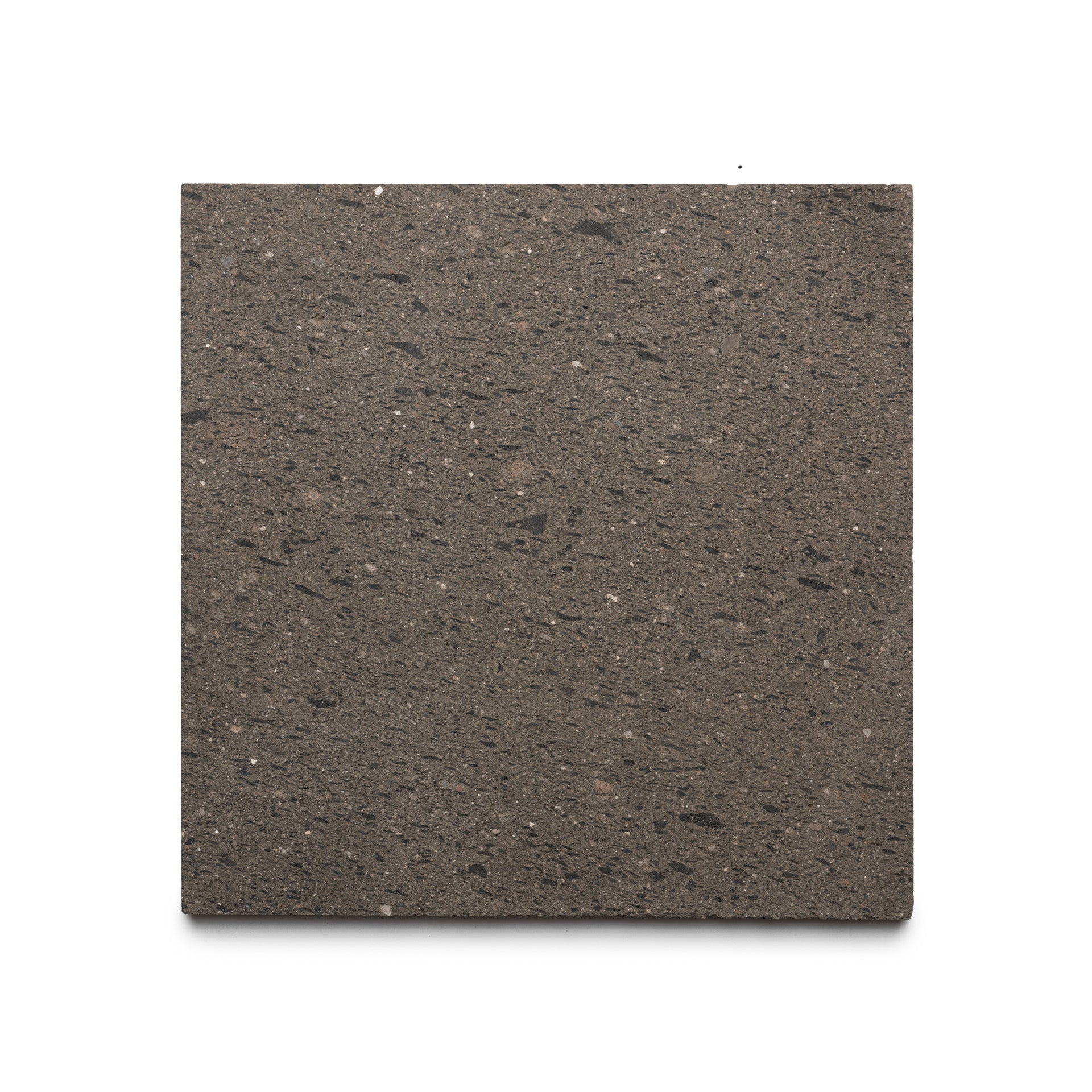 The Volcan 12x12 by Zia Tile is a square, dark brown Cantera stone tile with a slightly rough texture and subtle speckles, shown against a white background.